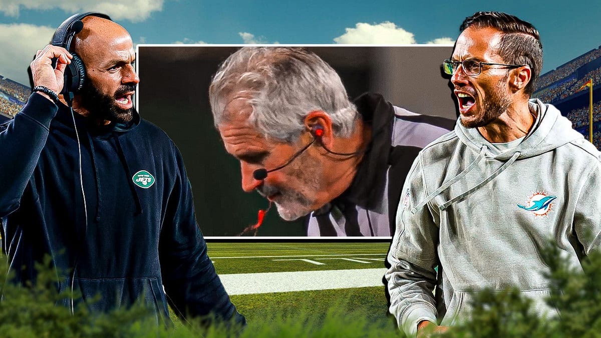 An official was spitting blood after a fight between the Dolphins and Jets