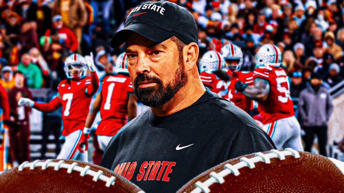 Ryan Day in Ohio State gear with his team behind him.
