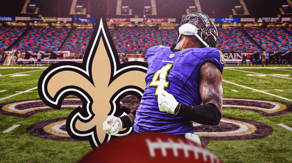 Jason Pierre Paul with Saints logo