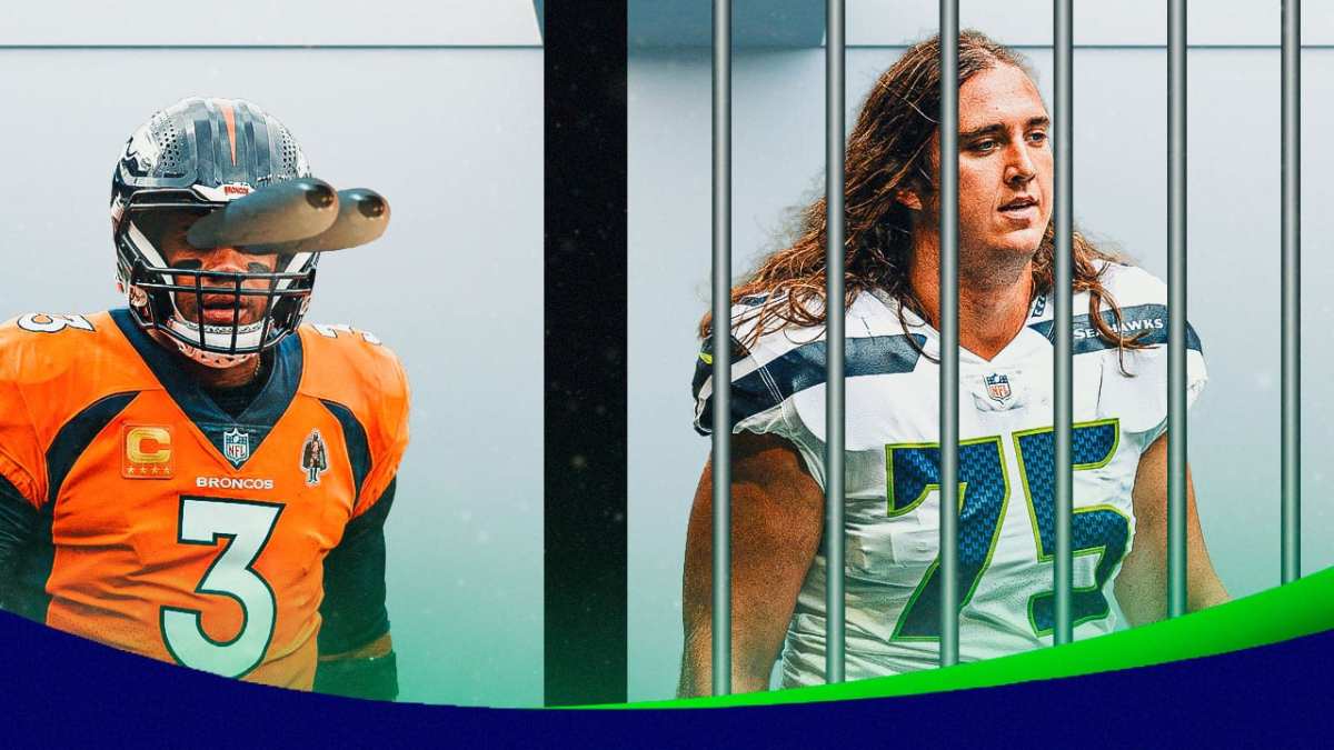 Russell Wilson looking at Chad Wheeler behind bars.