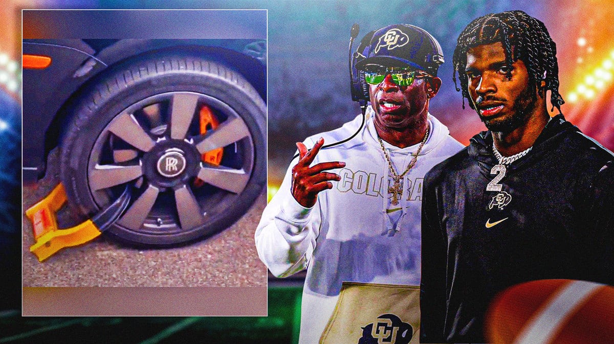 Colorado coach Deion Sanders and quarterback Shedeur Sanders look at Shedeur's car after it was booted by campus police.