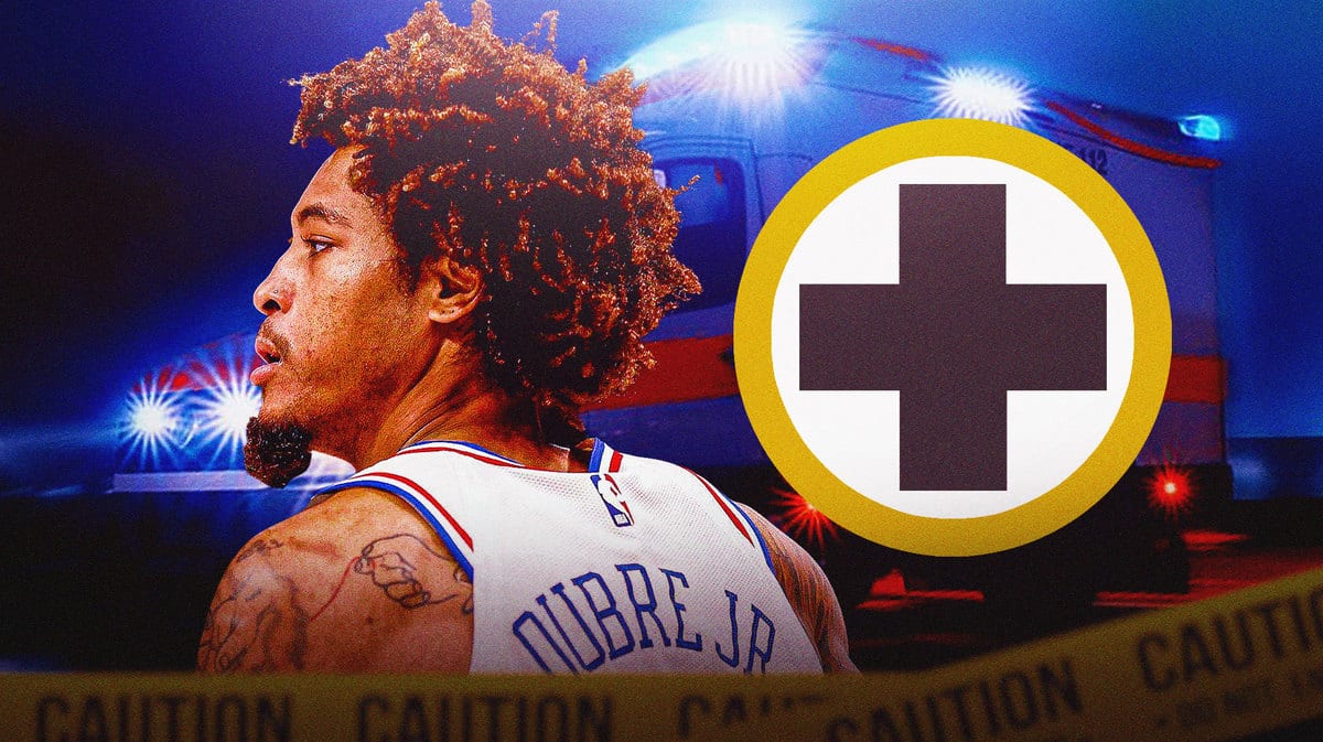Kelly Oubre Jr of the Sixers with medical cross symbol and ambulance in the background