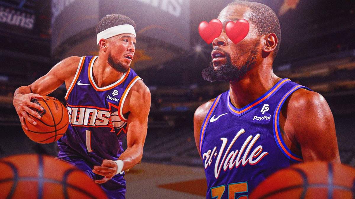 Kevin Durant looking at Devin Booker in action with heart eyes, both players in Suns jerseys, Footprint Center as background