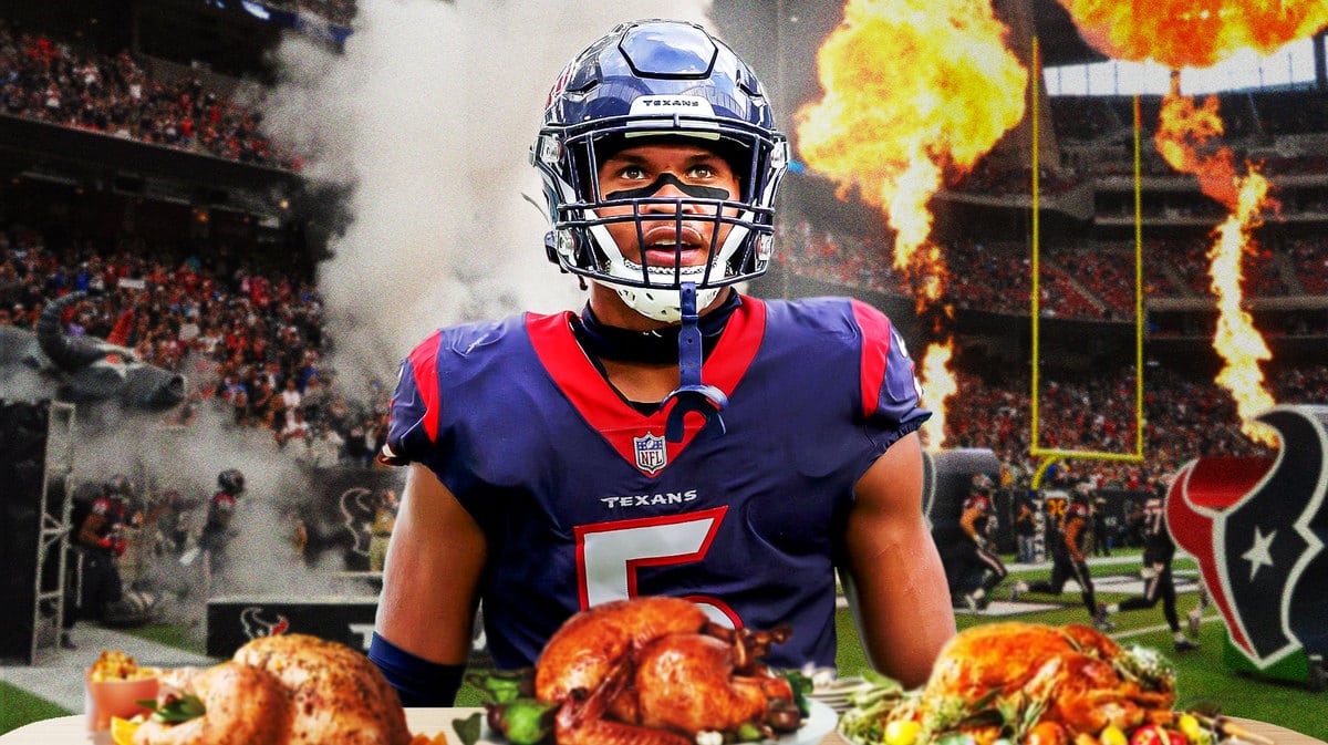 Texans' Jalen Pitre with thanksgiving turkeys