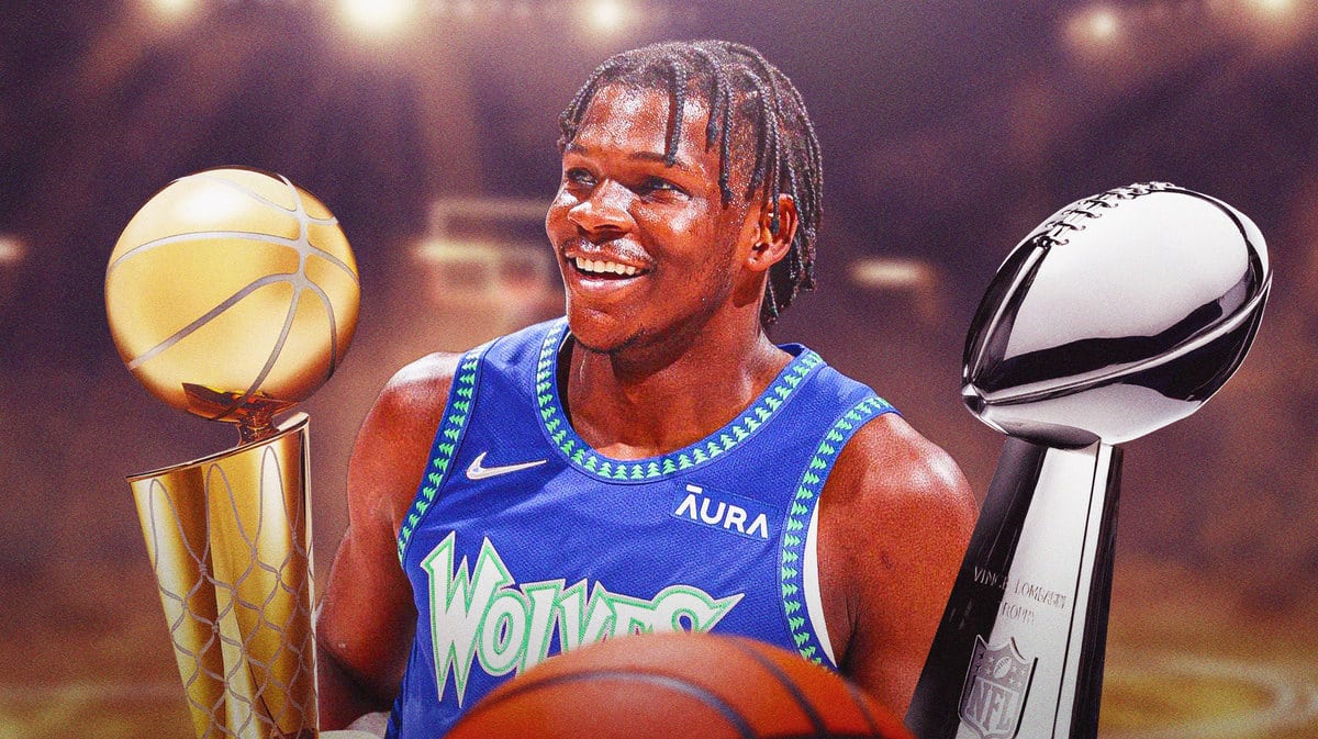 Minnesota Timberwolves star Anthony Edwards with the Larry O'Brien Trophy and the Lombardi Trophy