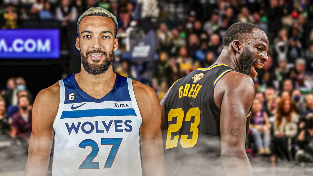 Rudy Gobert smiling next to Draymond Green