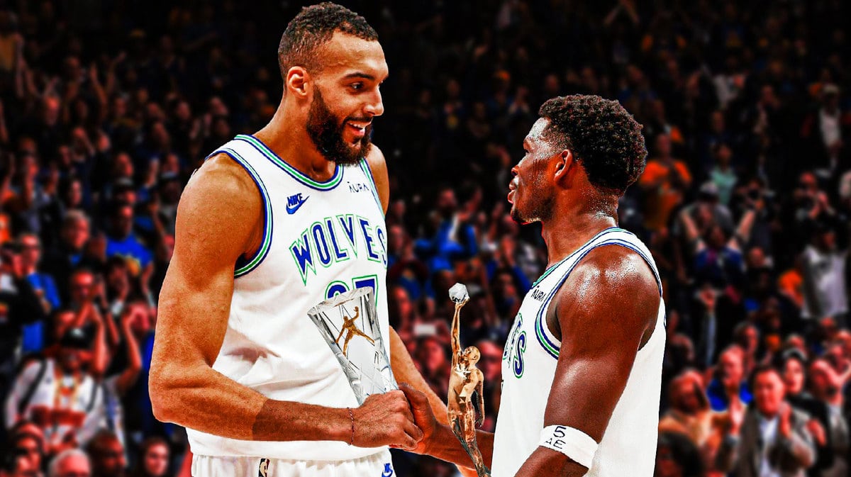 Timberwolves stars Anthony Edwards and Rudy Gobert holding trophies