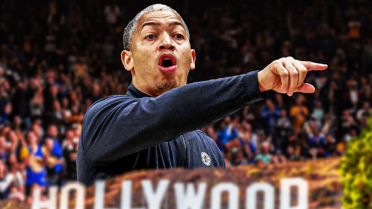 Los Angeles Clippers head coach Ty Lue in front of Cypto.com Arena, on top of the Hollywood sign.