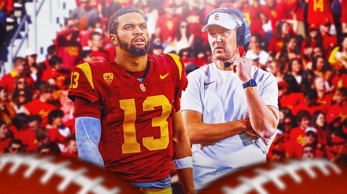 Photo: Caleb Williams and Lincoln Riley in USC gear with a disappointed face and USC fans behind them