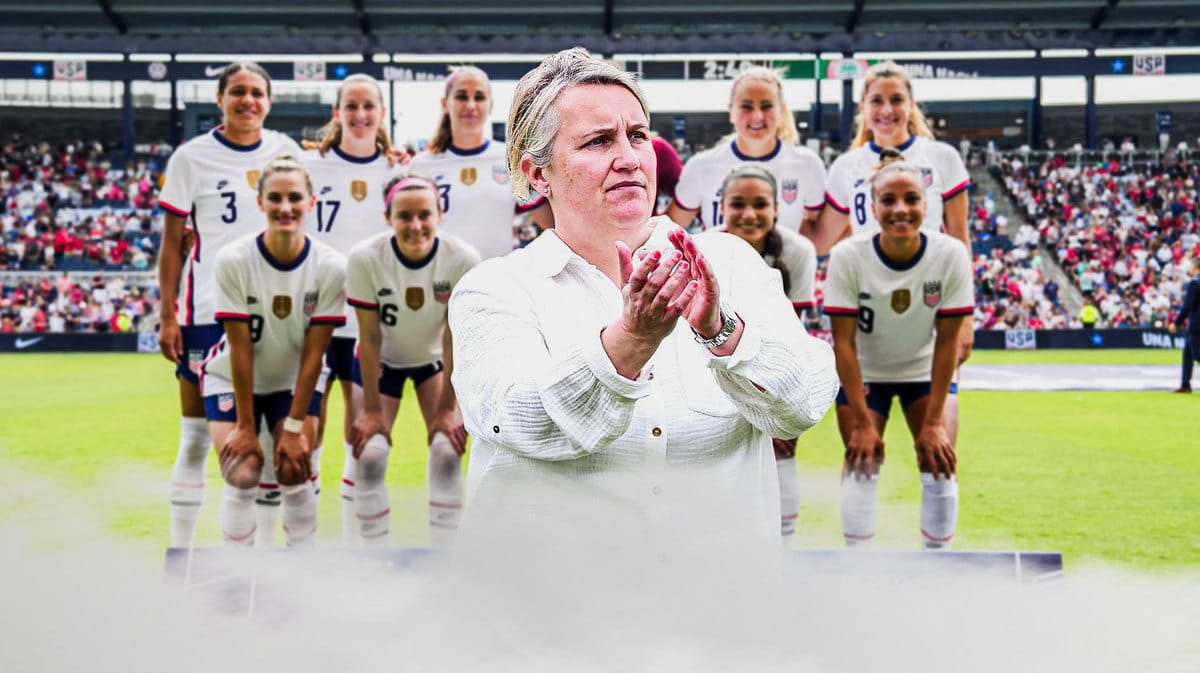 New USWNT head coach Emma Hayes, with the USWNT team in the background