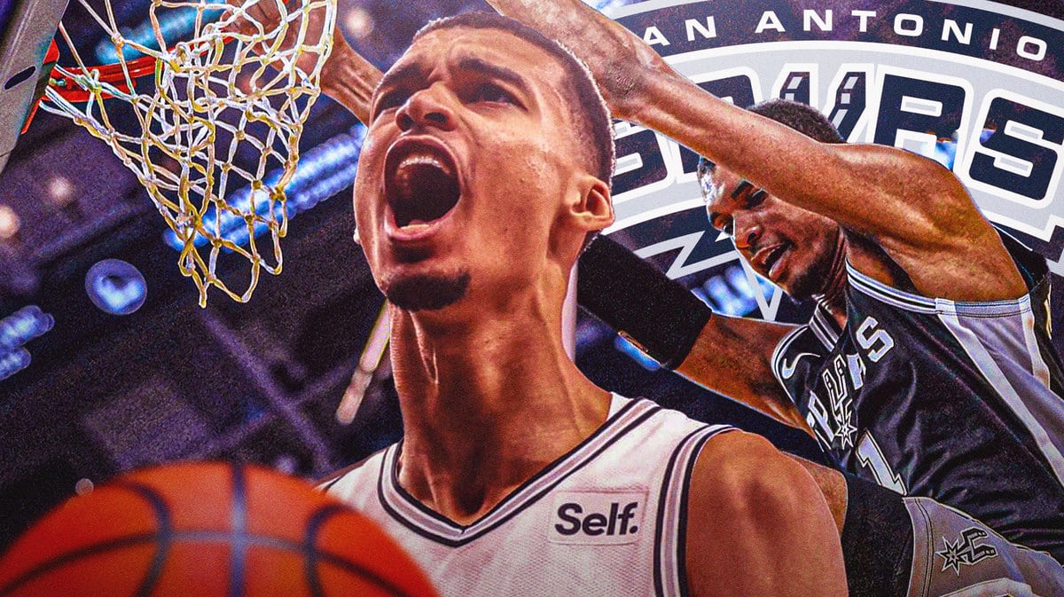 Spurs' Victor Wembanyama shouting and dunking the basketball