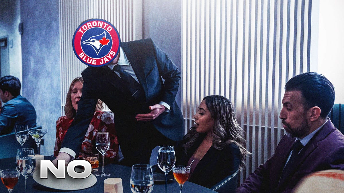 Blue Jays logo on the face of the waiter, Vladimir Guerrero Jr.