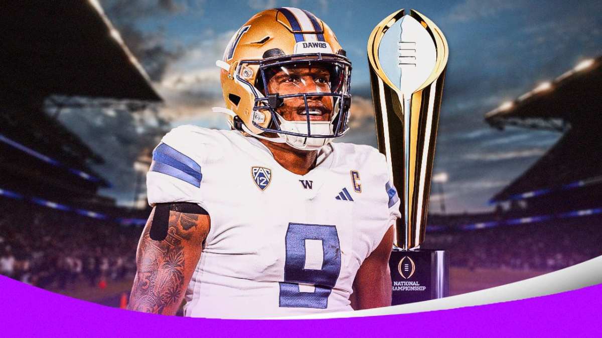 Washington football’s Michael Penix Jr. next to the College Football Playoff trophy