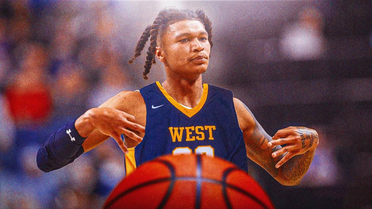 West Virginia basketball player RaeQuan Battle in the center of image.