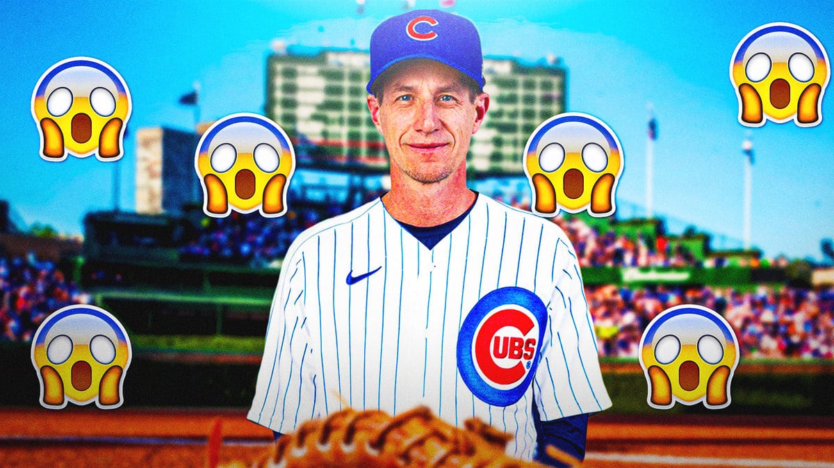 Craig Counsell wearing Cubs gear at Wrigley Field. Need the shocked emoji all over the image.