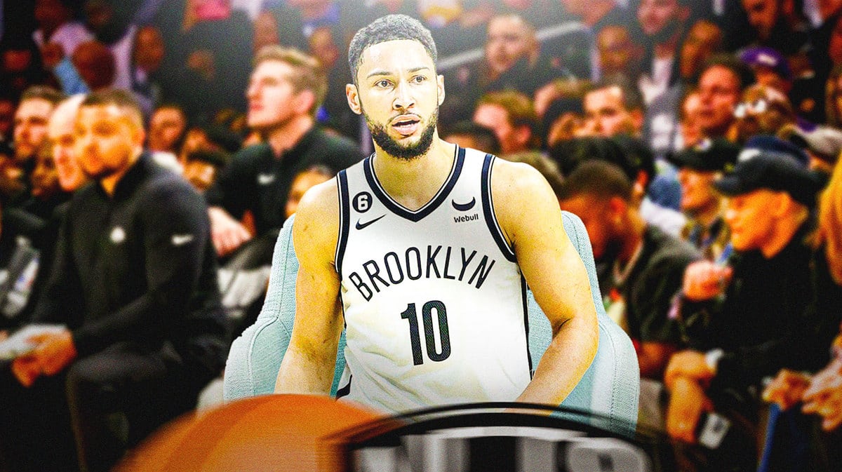 Nets' Ben Simmons sitting on an NBA sideline