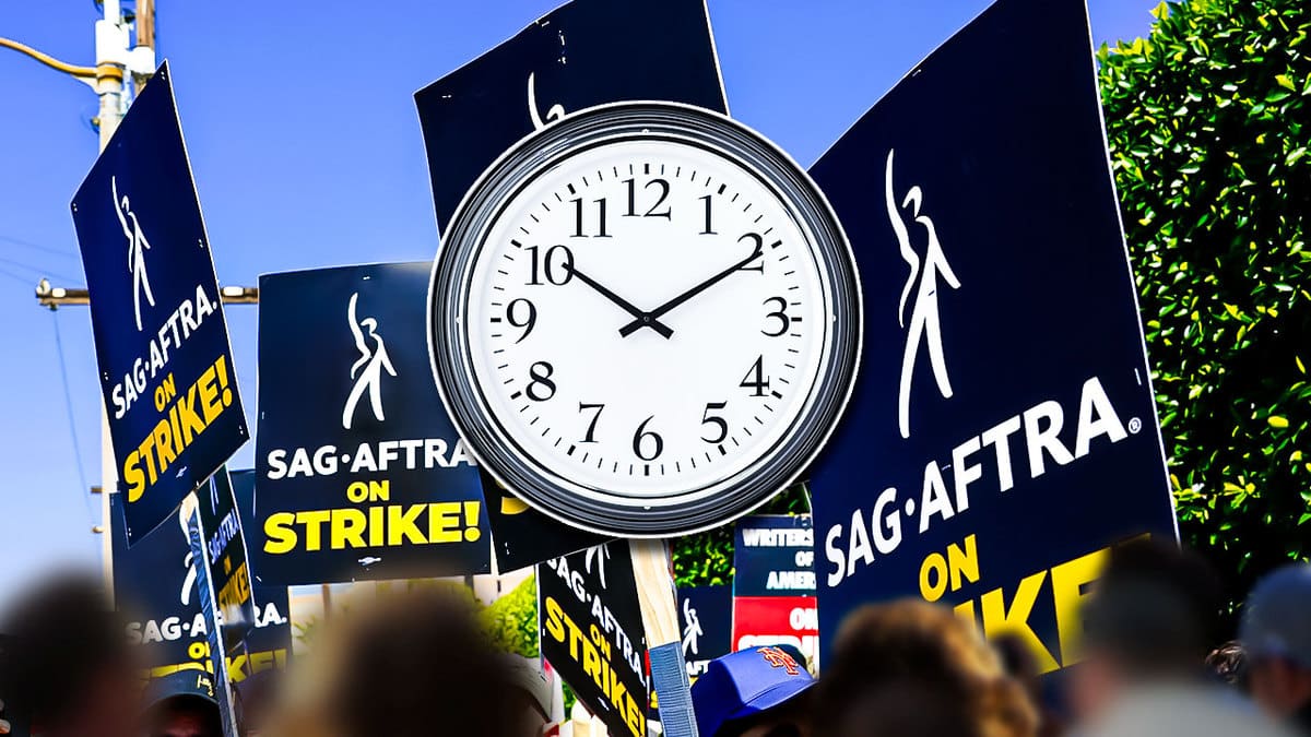 SAG-AFTRA strike signs and a clock.