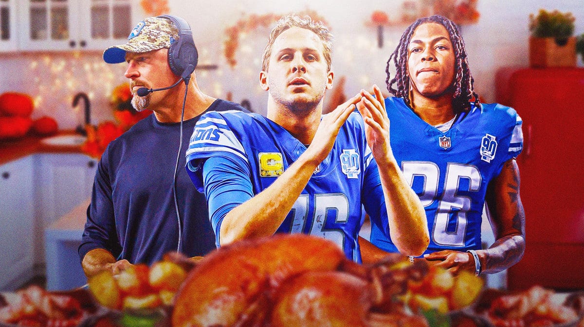 Jared Goff, Dan Campbell, Jahmyr Gibbs in Lions jerseys with turkey dinner in front of them