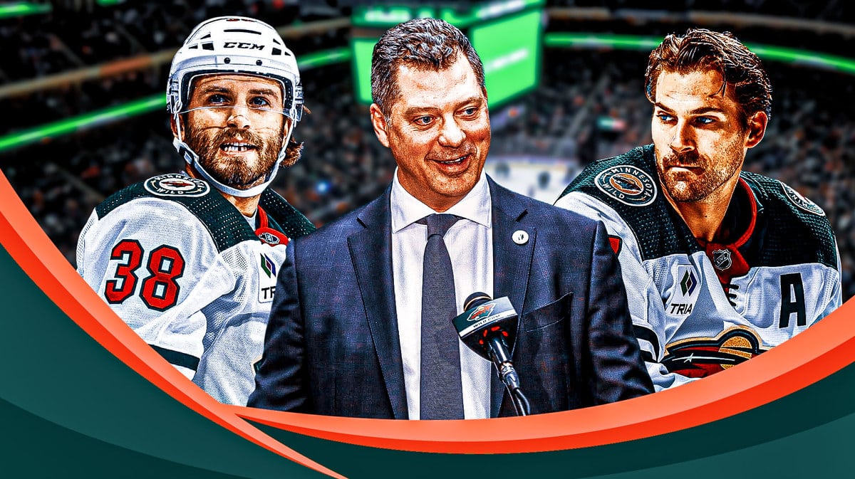Minnesota Wild forwards Ryan Hartman and Marcus Foligno react to a team meeting led by general manager Bill Guerin