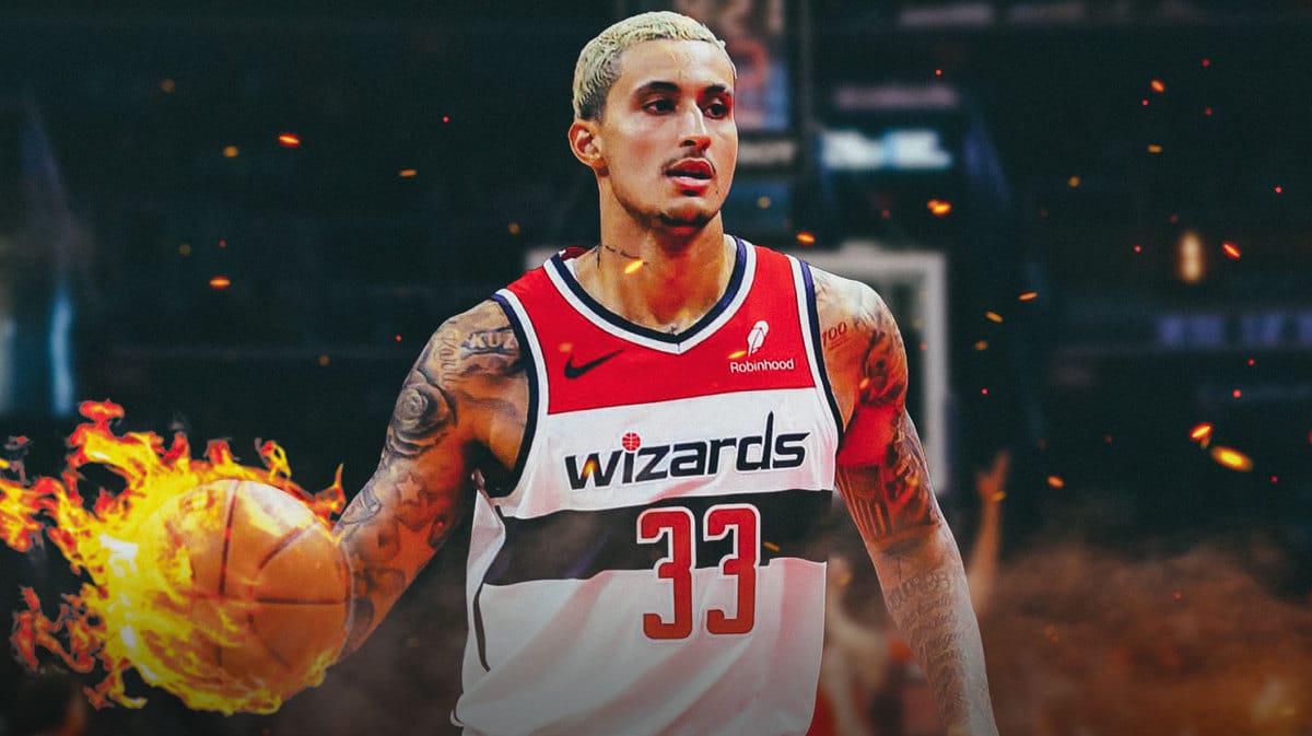 ACTION SHOT of Kyle Kuzma (Wizards) making a pass with the ball in fire