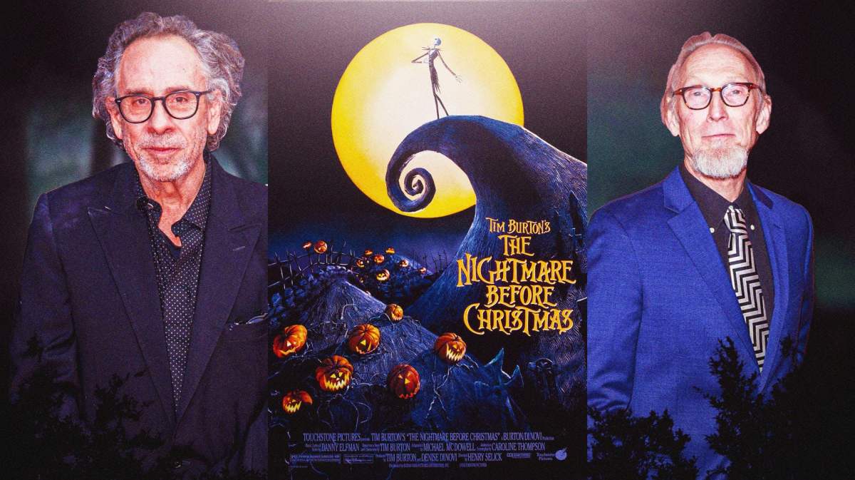 Tim Burton and Henry Selick in front of A Nightmare Before Christmas poster.