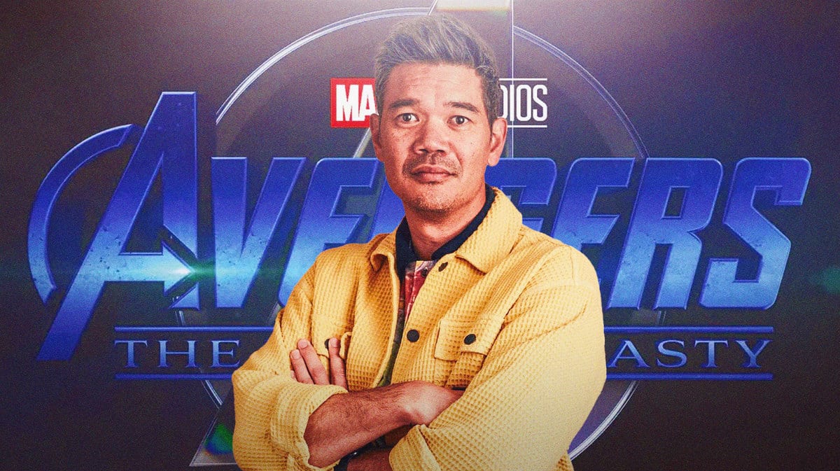 Shang-Chi and the Legend of the Ten Rings director Destin Daniel Cretton in front of MCU Avengers: The Kang Dynasty logo.