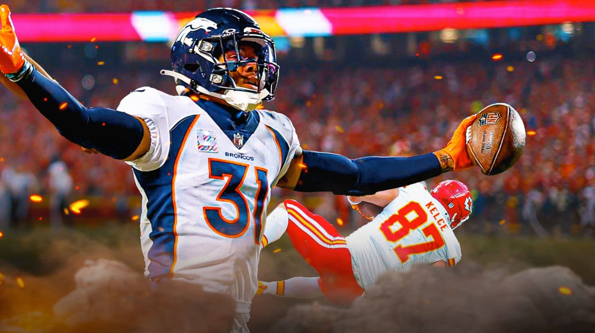 Justin Simmons celebrates in front of Travis Kelce