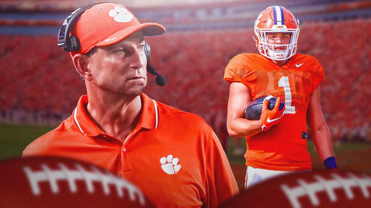 Clemson football HC Dabo Swinney looking at Will Shipley .