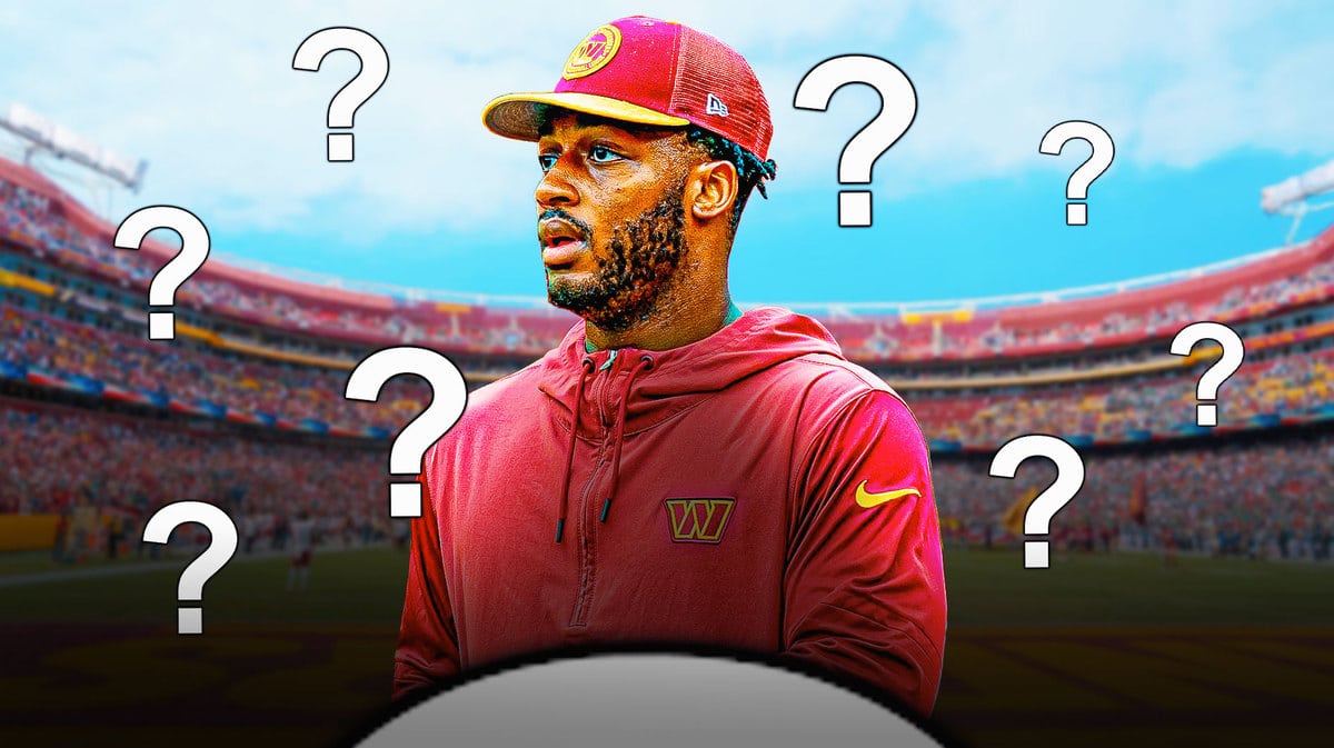 Washington Commanders' Antonio Gibson and a bunch of question marks around him to signal uncertainty.