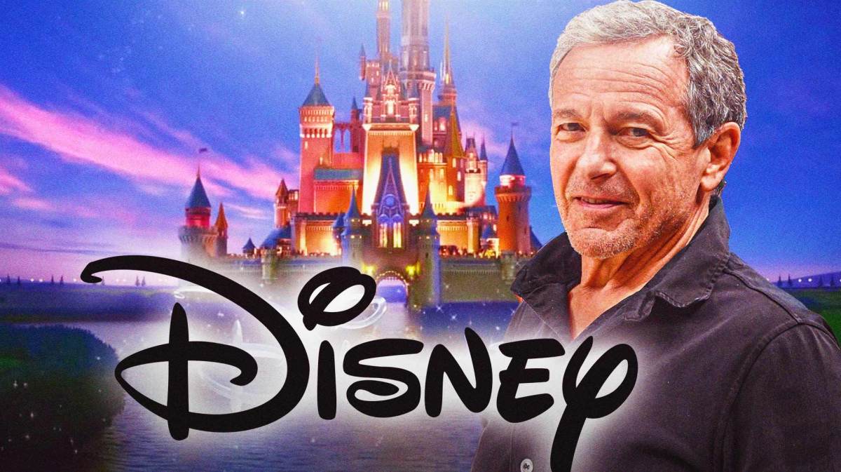 Bob Iger and Disney logo in front of castle logo.