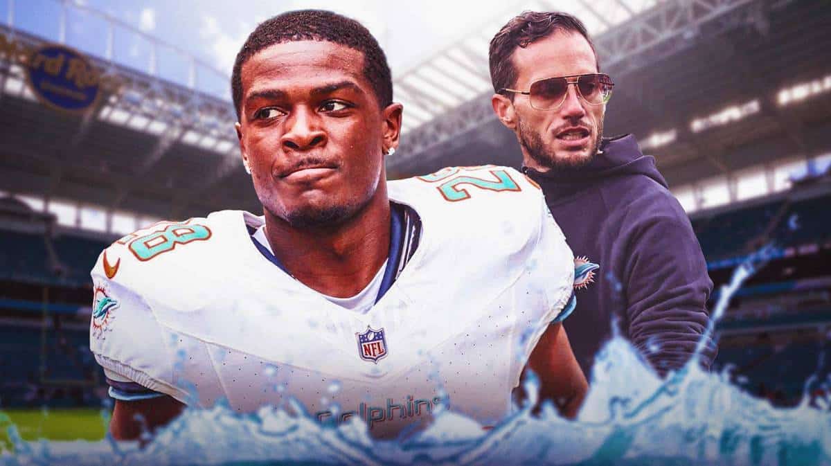 Miami Dolphins running back De'Von Achane and head coach Mike McDaniel in front of Hard Rock Stadium.