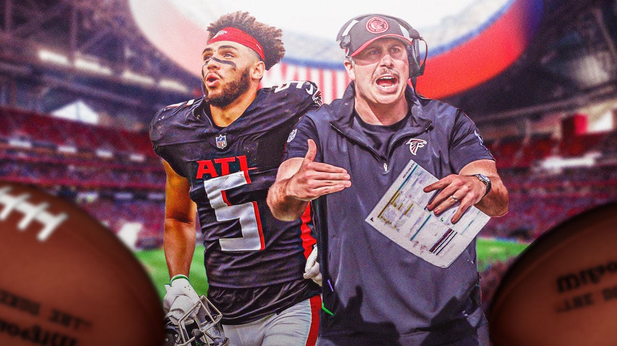 Drake London in Falcons uniform with Arthur Smith in Falcons gear together.