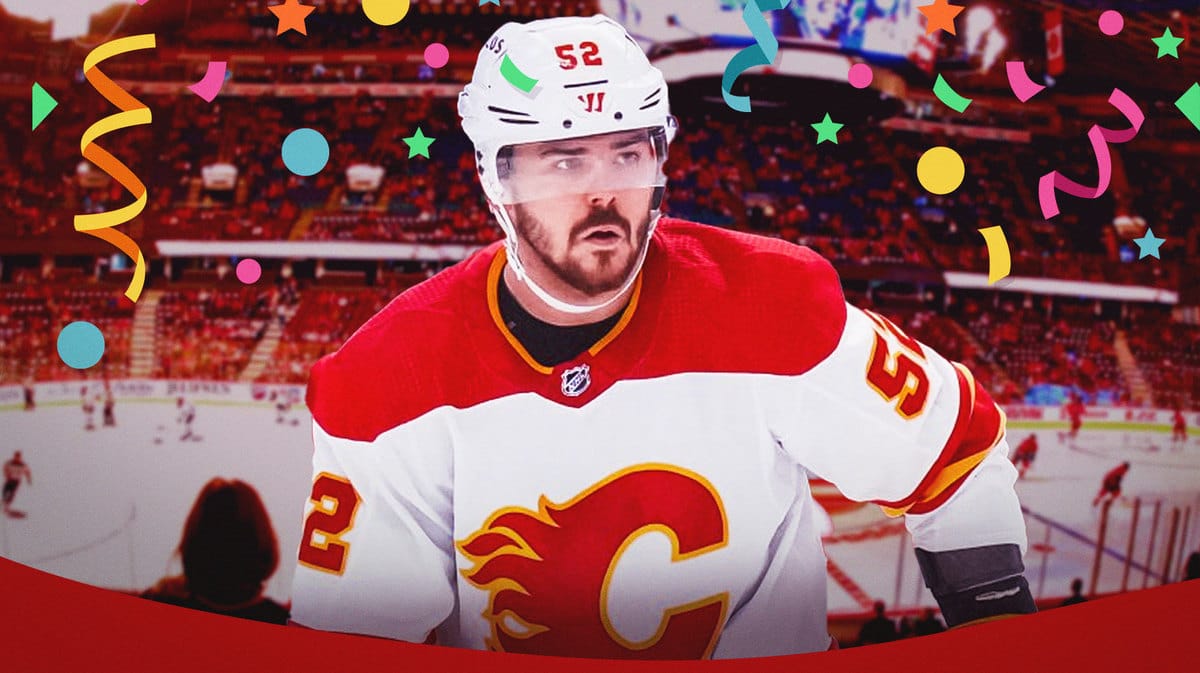 Calgary Flames defenseman MacKenzie Weegar celebrating his first career overtime-winning goal against the Vegas Golden Knights on November 28, 2023