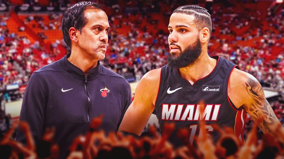 Miami Heat head coach Erik Spoelstra and star Caleb Martin in front of the Kaseya Center.