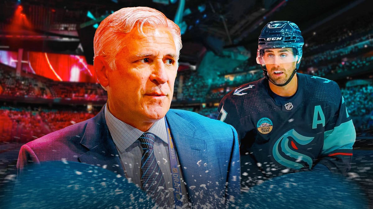 Seattle Kraken general manager Ron Francis with veteran forward Jordan Eberle after he picked up an injury in practice
