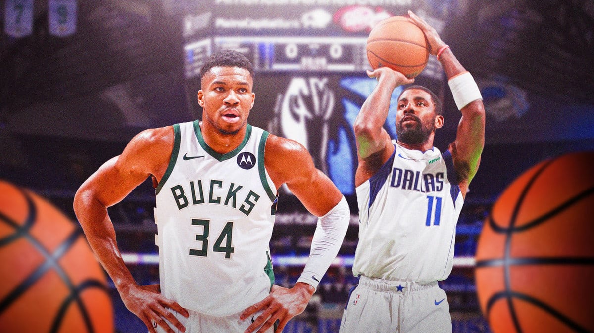 Mavs' Kyrie Irving shooting a basketball. Bucks' Giannis Antetokounmpo looking at Irving.