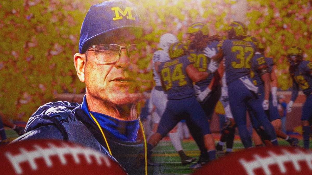 Michigan coach Jim Harbaugh in the foreground on the left, fading away, as players from Penn State and Michigan play on the right.