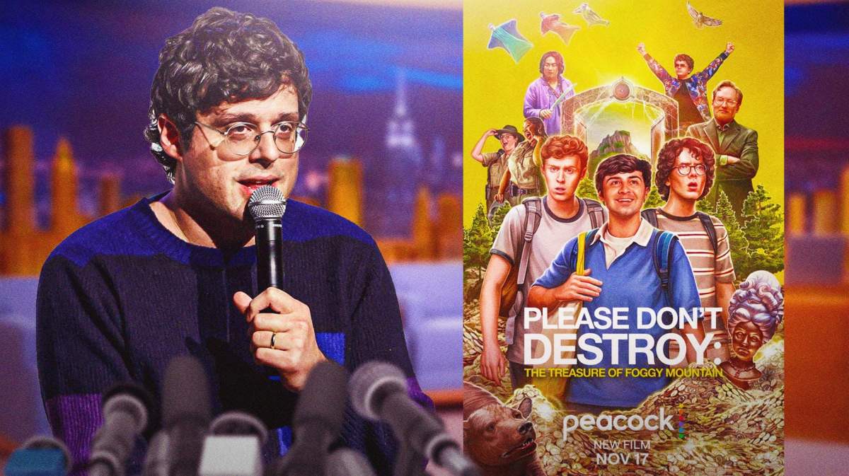 SNL alum Paul Briganti next to Please Don't Destroy: The Treasure of Foggy Mountain poster with Tonight Show background.