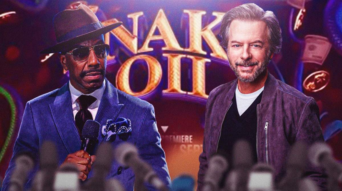J.B. Smoove and David Spade with Snake Oil poster in background.