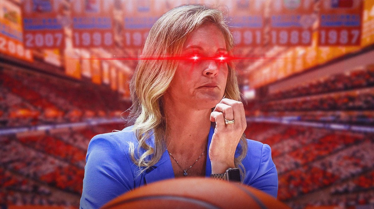 Tennessee women’s basketball coach Kellie Harper with red laser eyes