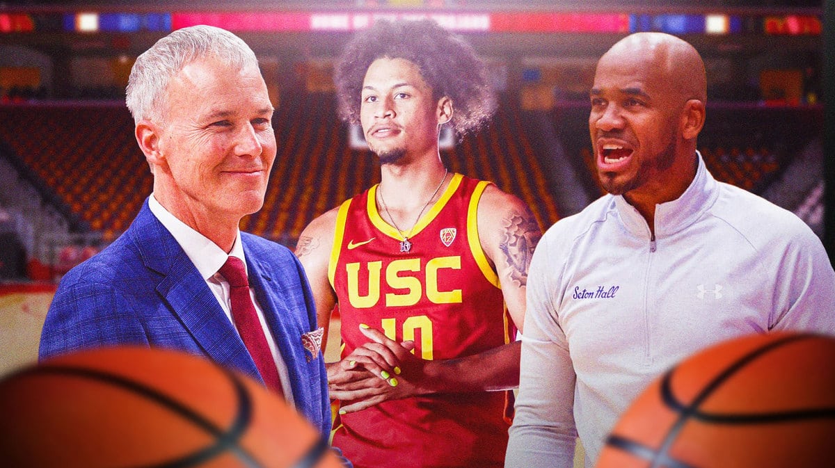 USC basketball HC Andy Enfield looking at Dj Rodman and Seton Hall HC.