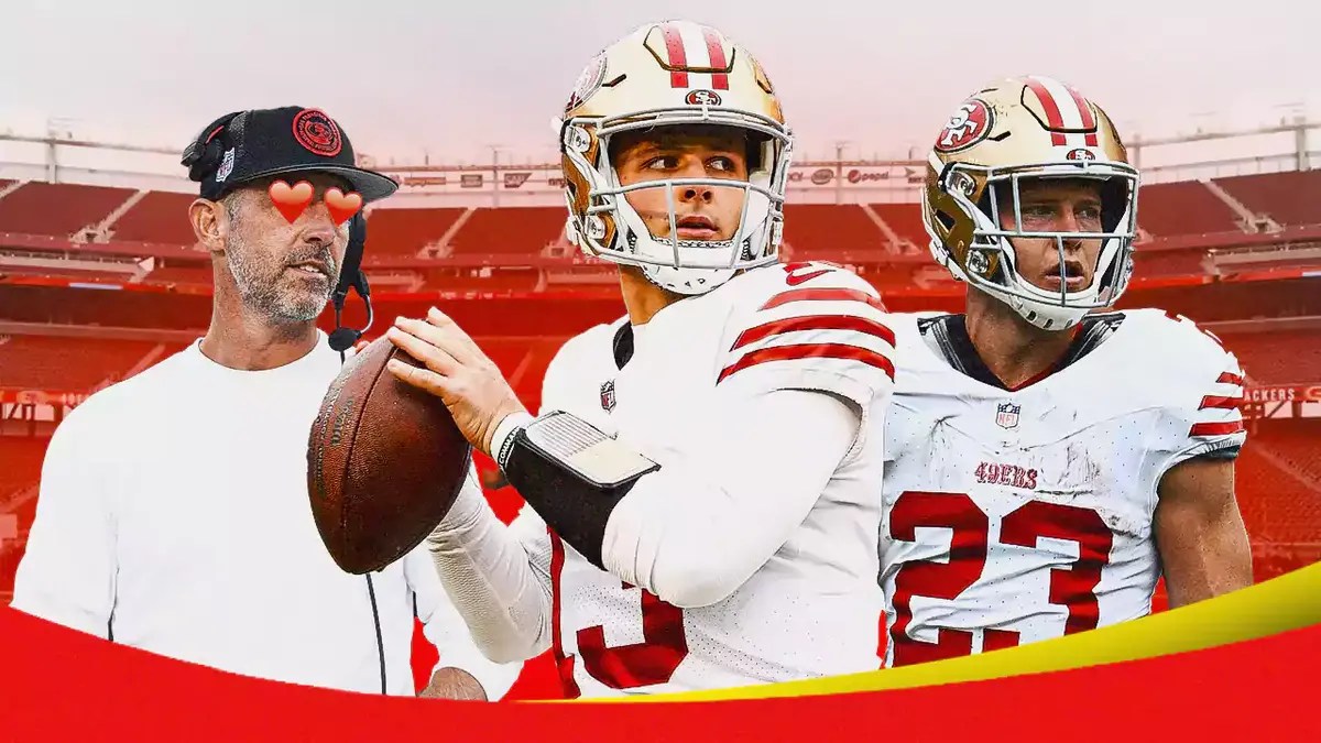 Kyle Shanahan with heart eyes looking at Brock Purdy and Christian McCaffrey