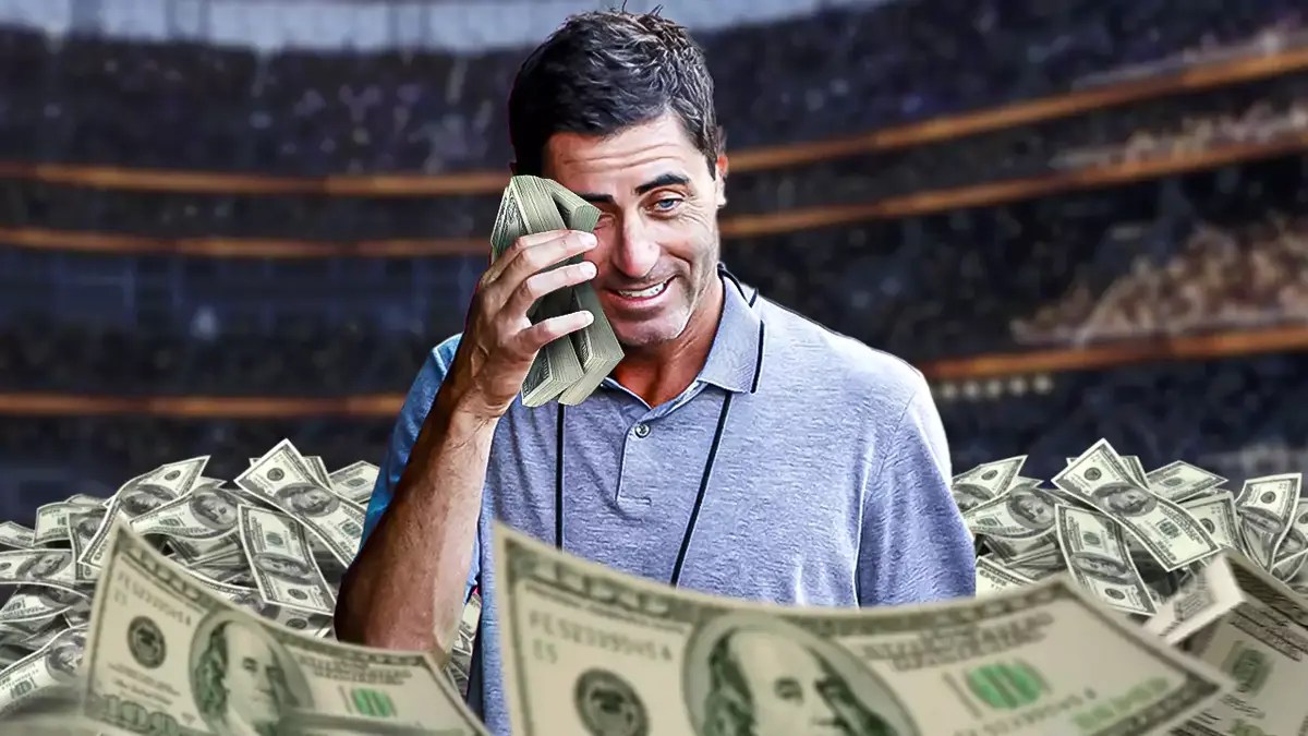 Padres President AJ Preller surrounded by cash