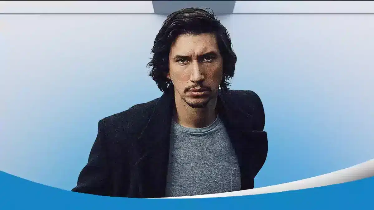 Actor Adam Driver with blue background.