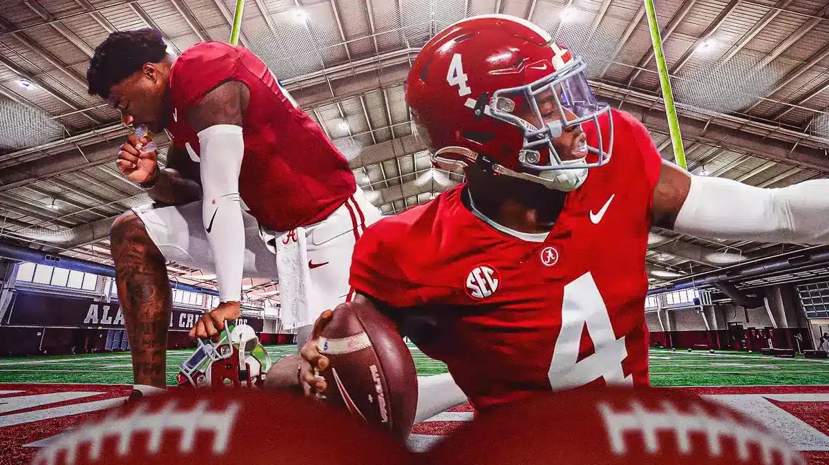 Alabama football quarterback Jalen Milroe in front of the Crimson Tide practice field.