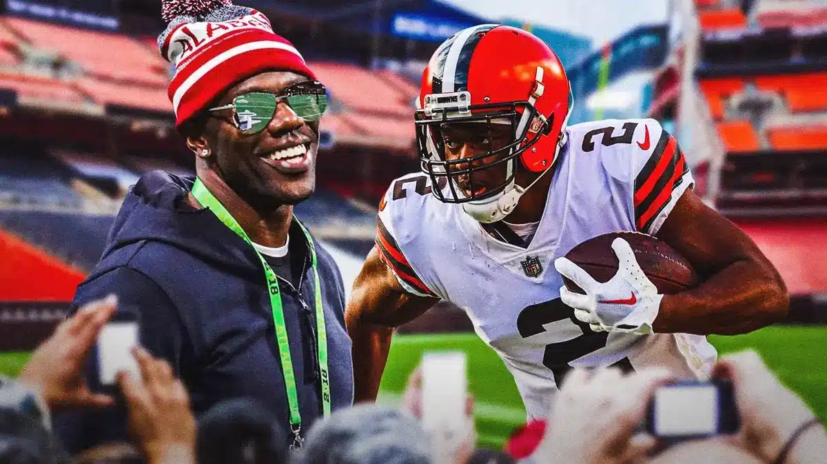Browns' Amari Cooper catching a football. Need Terrell Owens in front smiling.