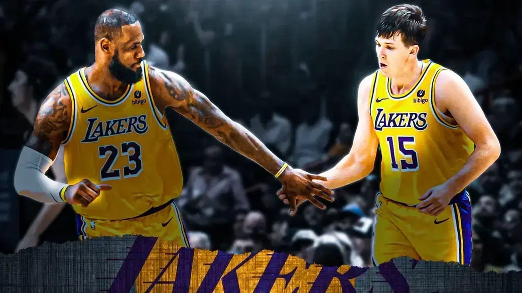 Lakers stars LeBron James and Austin Reaves high-fiving