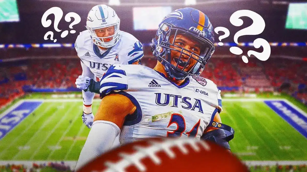 Trey Moore in middle of image looking stern, just a few question marks around him, NCAA football field in background
