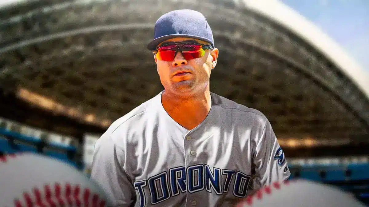 Isiah Kiner-Falefa in a Blue Jays uniform with Rogers Centre in background.