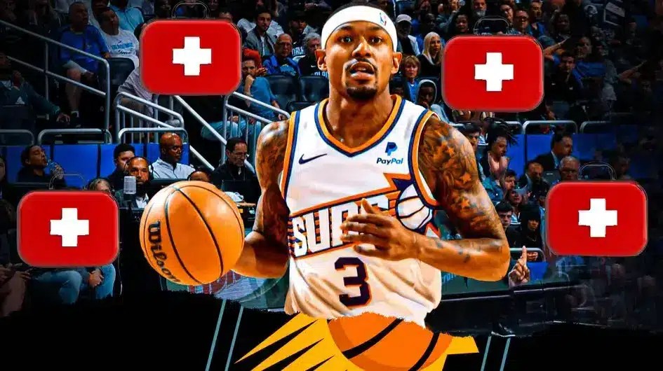 Bradley Beal looking serious with medical kit around him in Suns jersey
